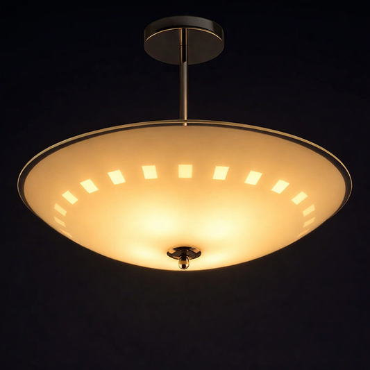Ceiling light fixture with a warm glow on a black background