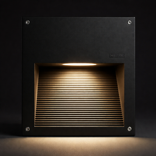 Square outdoor light fixture with a dark finish on a black background