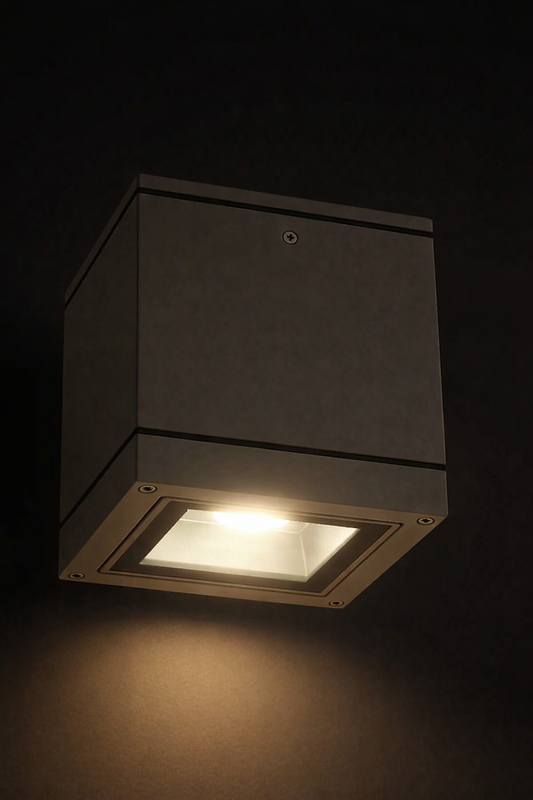 Square ceiling light fixture on a dark background
