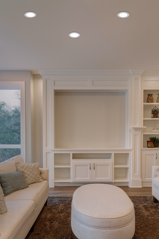 White ceramic plate on a recessed panel light