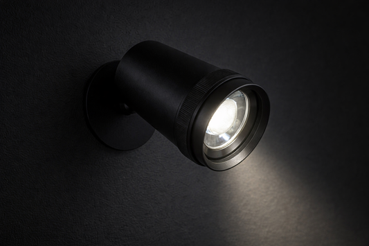 Black spotlight on a dark background