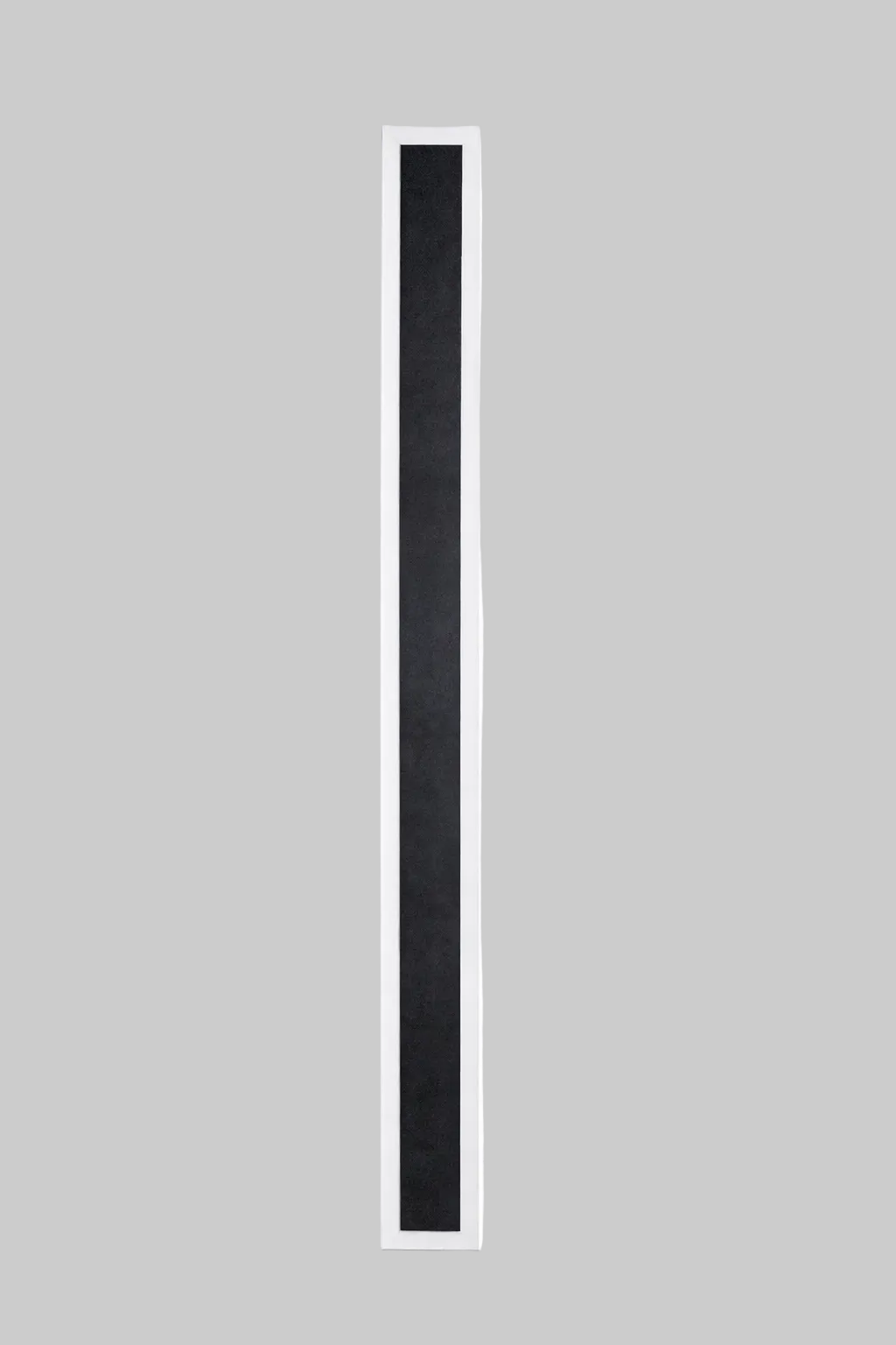 Black rectangular object on a white background