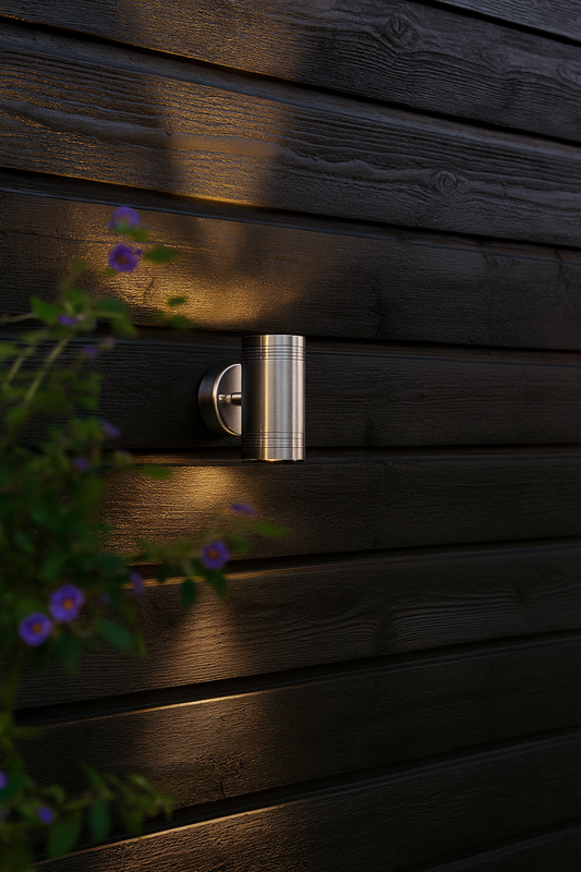 Metallic wall mounted light in a outdoor wall