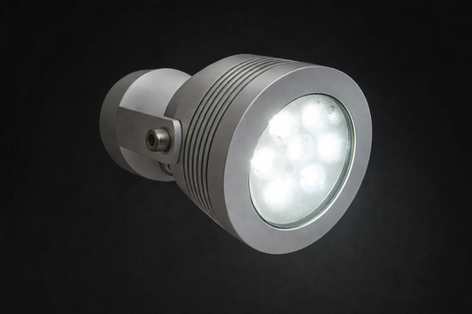 Silver spotlight with a black background