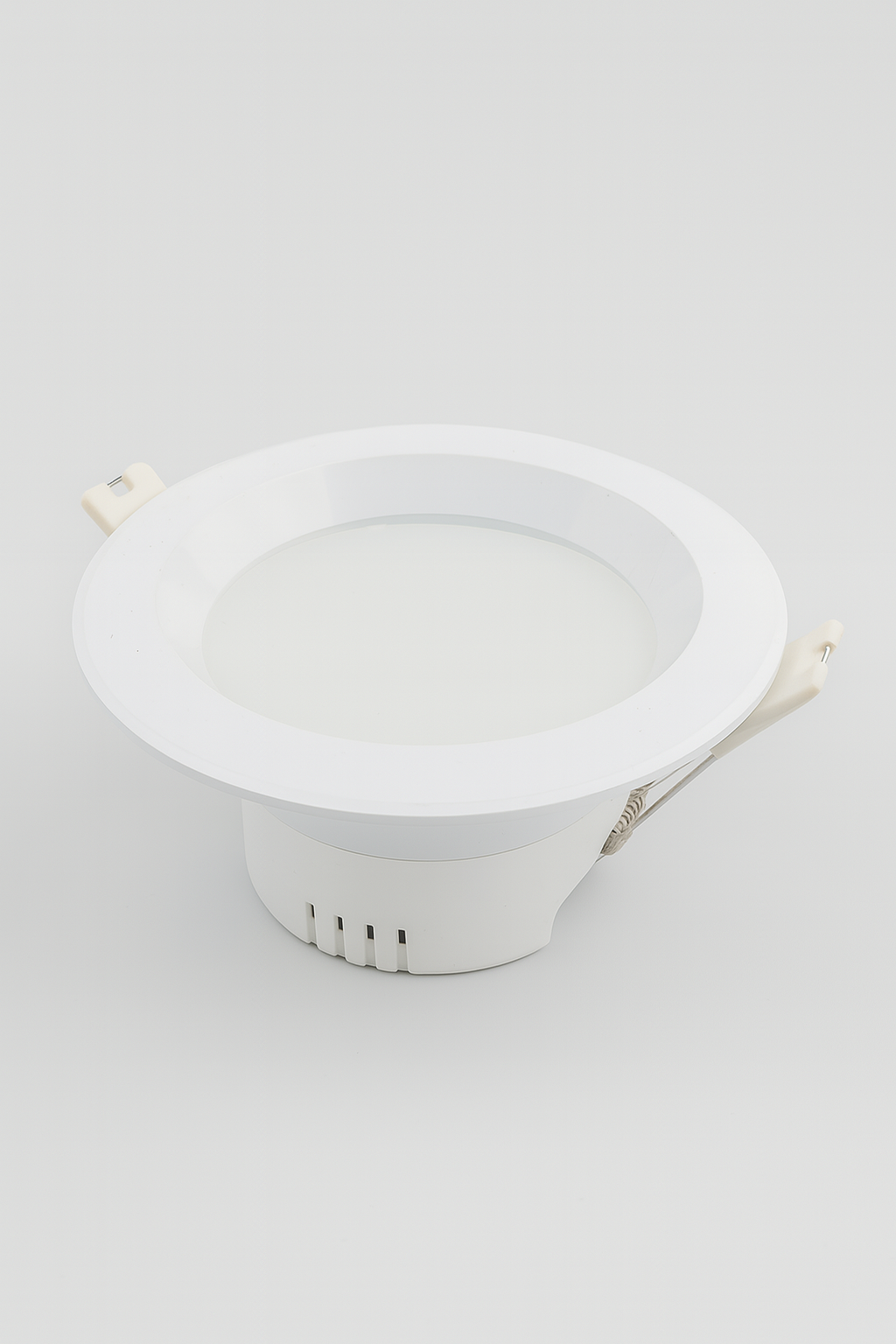 White recessed ceiling light on a white background