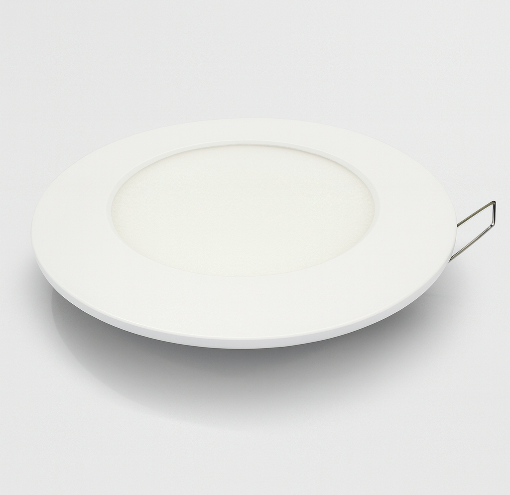 White ceramic plate on a recessed panel light
