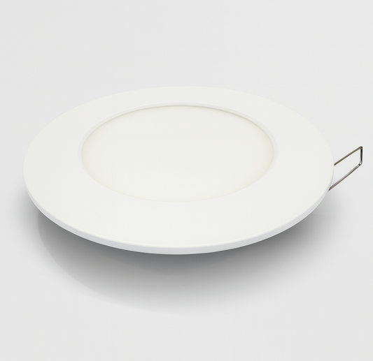 White ceramic plate on a recessed panel light