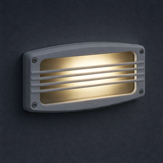 Rectangular outdoor light fixture on a dark background