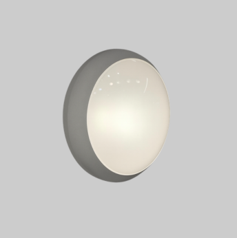 Round wall light fixture on a gray background