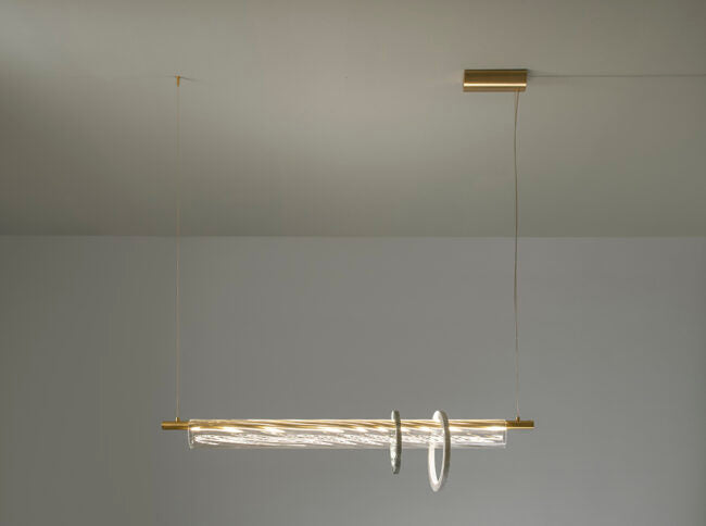 Modern pendant light fixture hanging from a ceiling