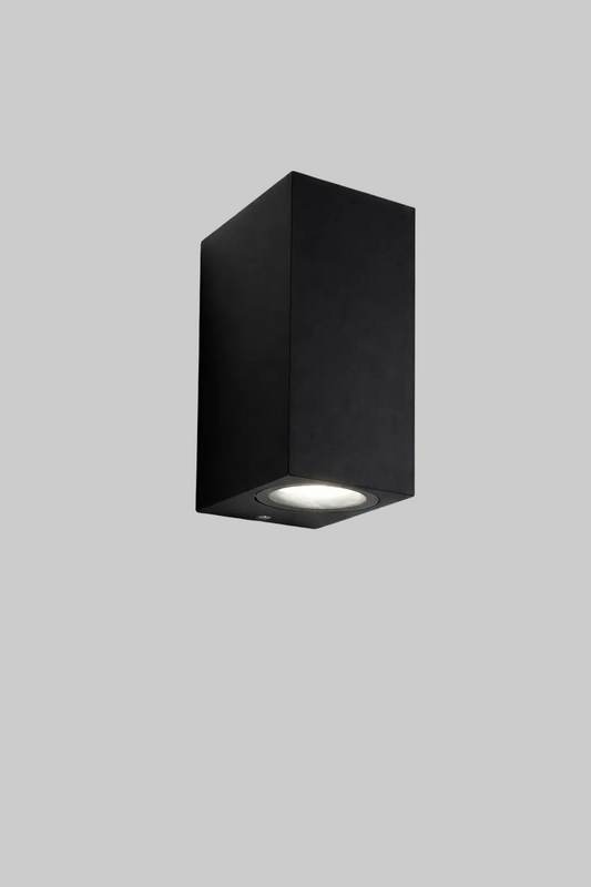 Black wall-mounted light fixture on a white background