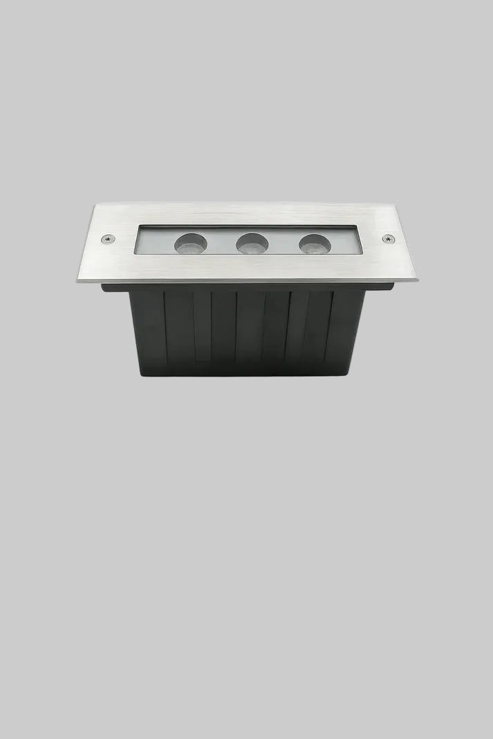 Rectangular outdoor light fixture on a gray background