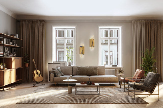 Modern living room with a sofa, coffee table, and decorative items.