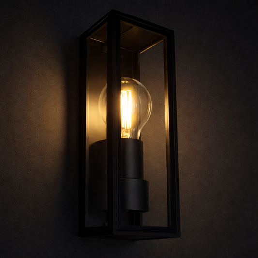 Wall-mounted light fixture with a glowing bulb on a dark background