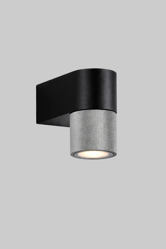 Modern wall-mounted light fixture with black and gray design on a white background