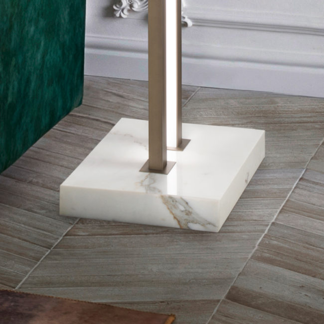 Marble base of a lamp on a wooden floor