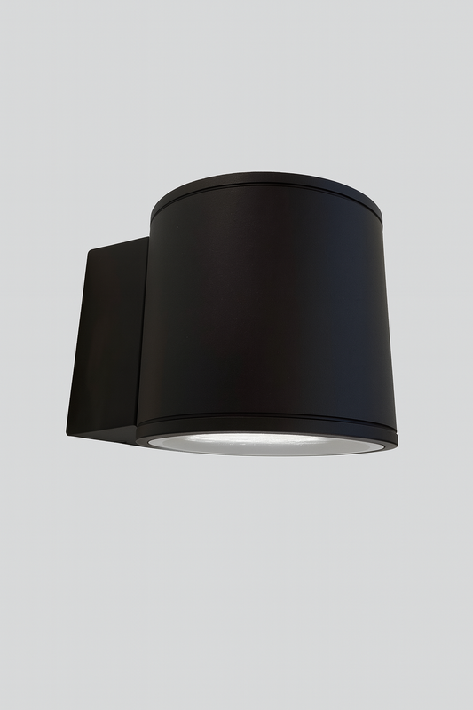 Black cylindrical outdoor mounted wall light fixture with GU10 Base 