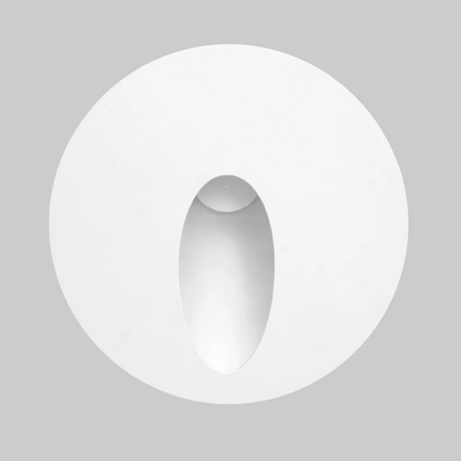Round white object on a light gray background