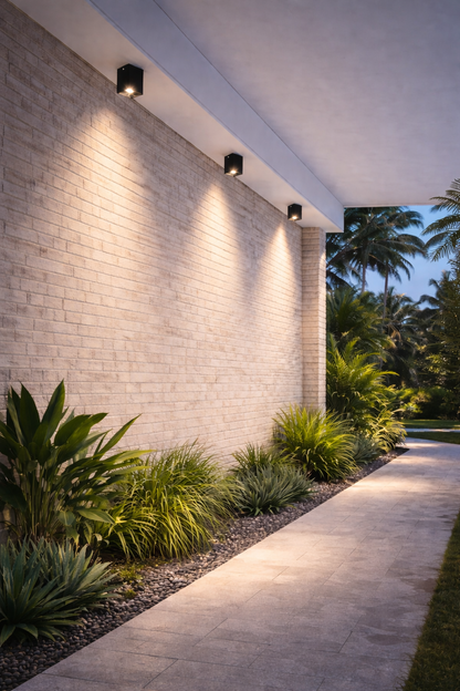 Black mounted downlight in a modern pathway
