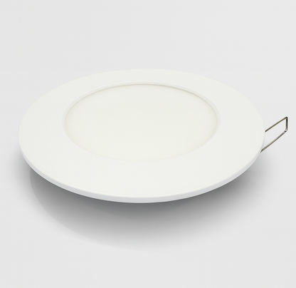 White ceramic plate on a recessed panel light