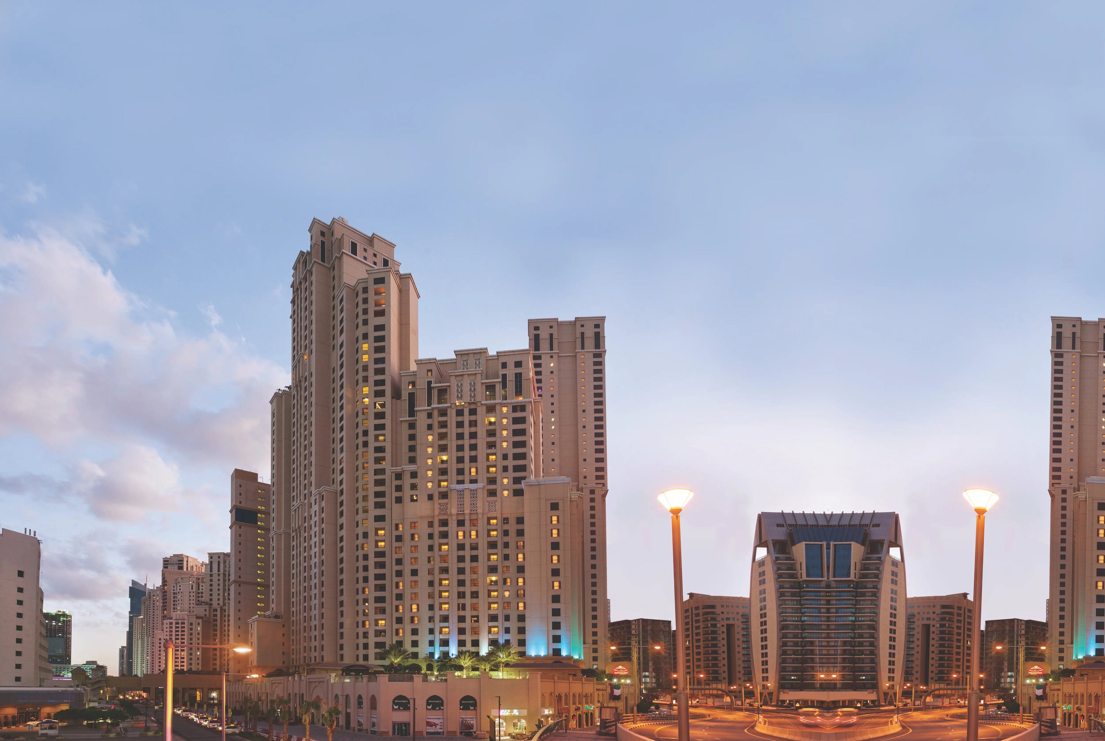 Exterior facade and beachfront lighting at Ramada Hotel & Suites by Wyndham, JBR
